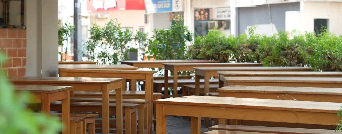 Covered outdoor terrace seating at Aaraamam Karama